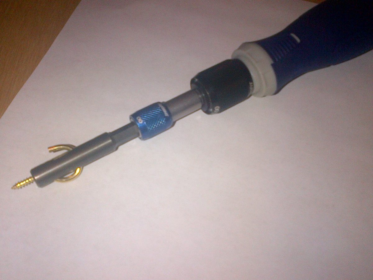 EasyHook Driver on a hand driver with a cup hook loaded
